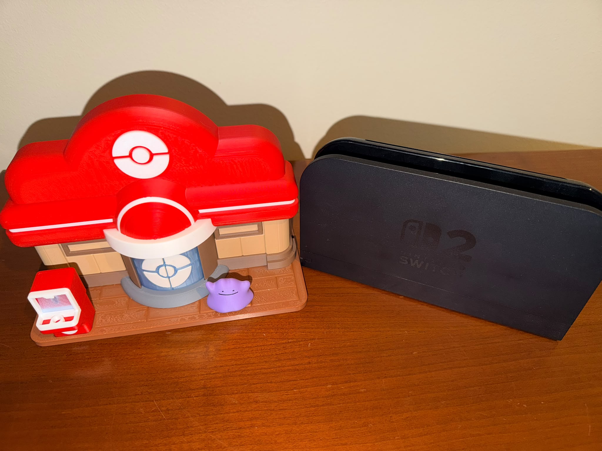 Suporte para Dock Station Nintendo Switch 2 – Centro Pokémon Pokopia | Decoração Gaming
